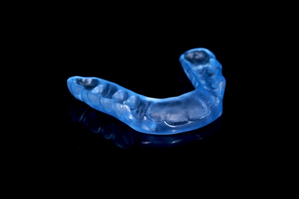 How A Night Guard From Your Dentist Can Help With Nighttime Teeth Grinding